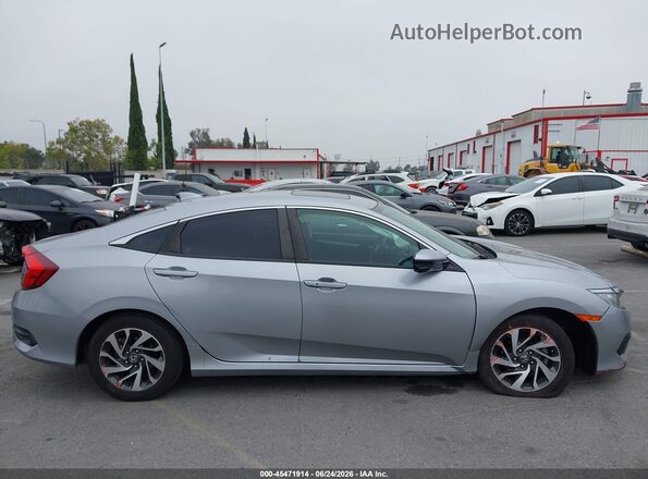 2HGFC2F70JH502605 2018 HONDA CIVIC Silver Widok wnętrza z tyłu
