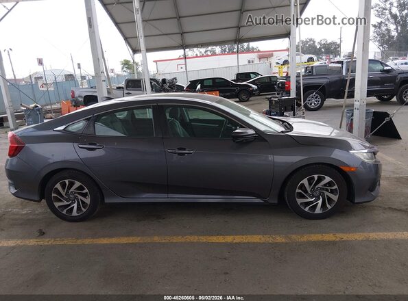 2HGFC2F70JH608875 2018 HONDA CIVIC Серый Вид задней части салона