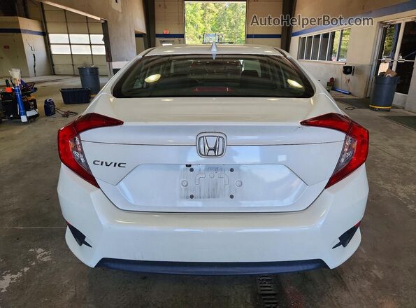 2HGFC2F72HH558863 2017 HONDA CIVIC White Rear view
