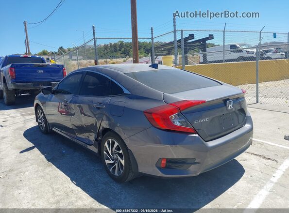 2HGFC2F73HH523023 2017 HONDA CIVIC Gray Trasero izquierdo