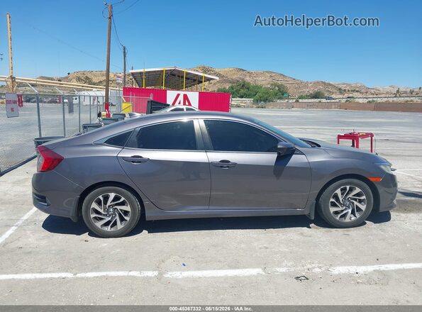 2HGFC2F73HH523023 2017 HONDA CIVIC Gray Vista interior trasera