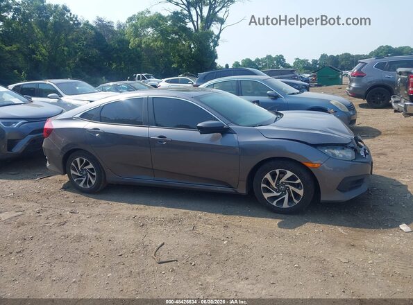 2HGFC2F73HH559519 2017 HONDA CIVIC Gray Rear interior view