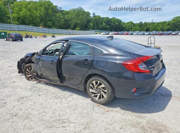 2HGFC2F74JH542590 2018 HONDA CIVIC Black 