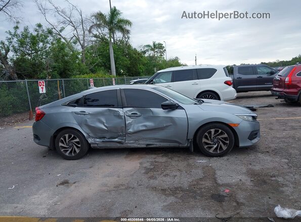 2HGFC2F77HH536275 2017 HONDA CIVIC Silver Սալոնի հետևի տեսք