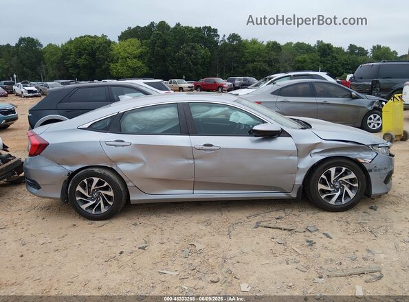 2HGFC2F79JH571549 2018 HONDA CIVIC Gray Widok wnętrza z tyłu