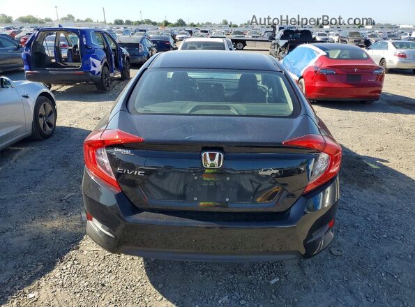 2HGFC2F82GH504034 2016 HONDA CIVIC Черный Вид сзади