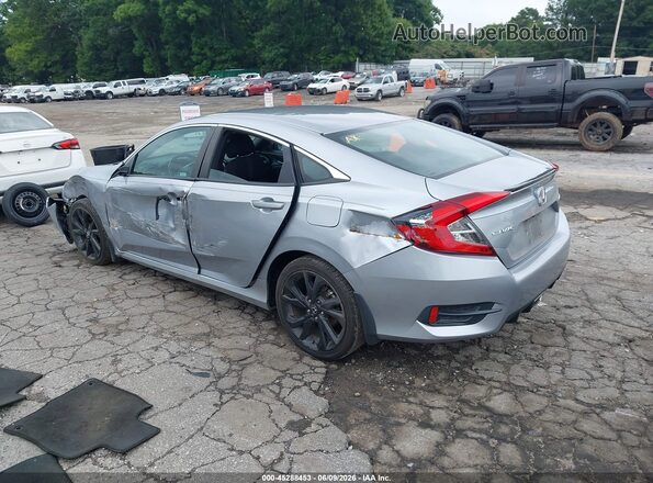 2HGFC2F89KH581928 2019 HONDA CIVIC Silver Trasero izquierdo