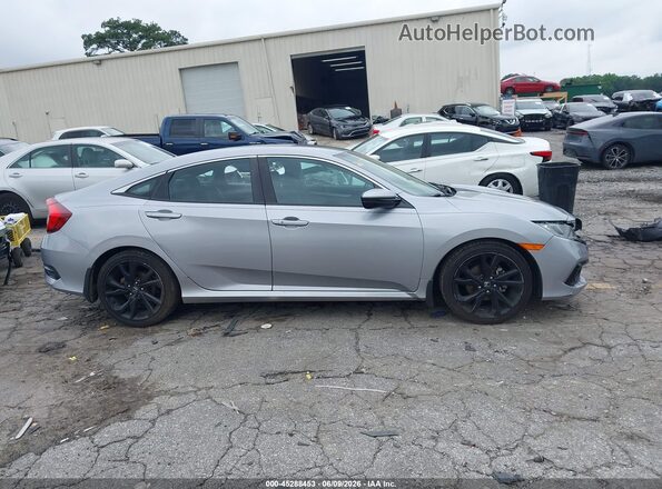 2HGFC2F89KH581928 2019 HONDA CIVIC Silver Vista interior trasera