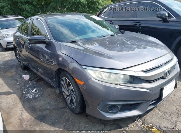 2HGFC2F8XGH504279 2016 HONDA CIVIC Gray Вид задньої частини салону