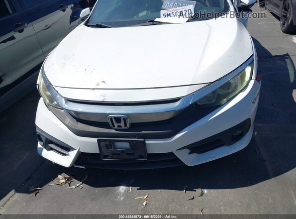 2HGFC3B39GH354598 2016 HONDA CIVIC White Rear interior view