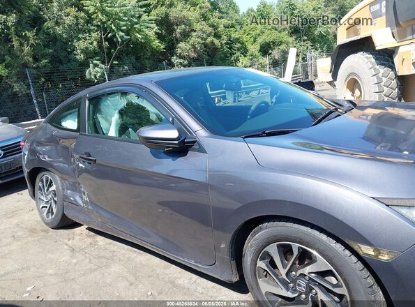2HGFC4B53HH300450 2017 HONDA CIVIC Gray Rear interior view
