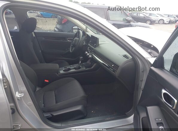 2HGFE1F77PH325175 2023 HONDA CIVIC Серебряный Вид салона спереди