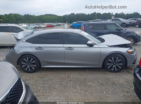 2HGFE1F77PH325175 2023 HONDA CIVIC Серебряный Вид задней части салона