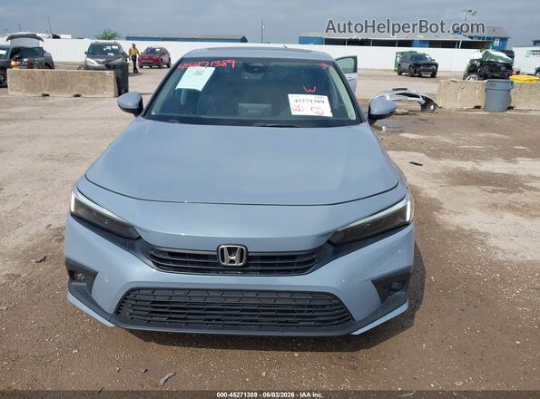 2HGFE1F95PH313835 2023 HONDA CIVIC Blue Vista interior trasera