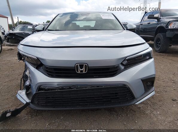 2HGFE1F99NH300065 2022 HONDA CIVIC Light Blue Vista interior trasera