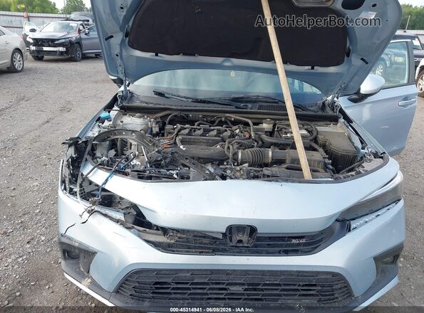 2HGFE1F9XPH310185 2023 HONDA CIVIC Light Blue Widok z tyłu