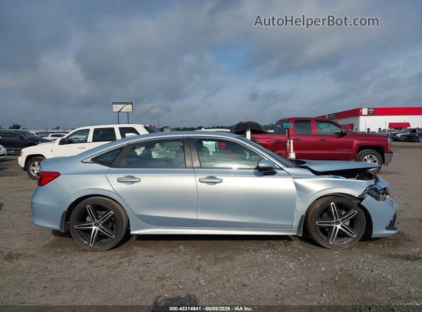 2HGFE1F9XPH310185 2023 HONDA CIVIC Light Blue Widok wnętrza z tyłu