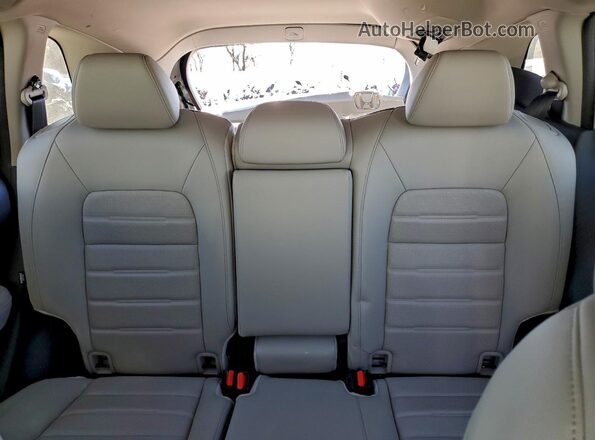 2HKRS3H77RH304043 2024 HONDA CR-V White Rear seats view