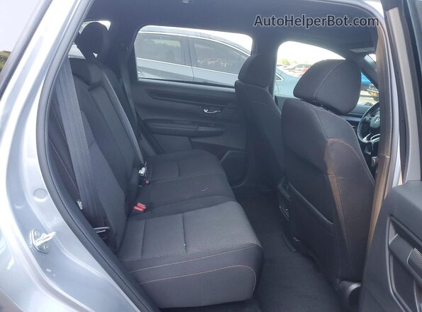 2HKRS5H54PH705959 2023 HONDA CR-V Серебряный Вид задней части салона