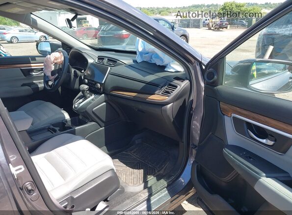 2HKRW2H55MH623091 2021 HONDA CR-V Gray Front interior view