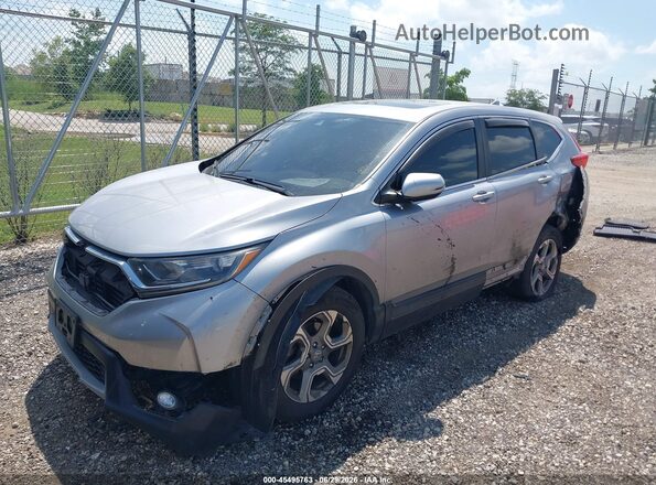 2HKRW2H56JH632989 2018 HONDA CR-V Серебряный Передняя левая четверть