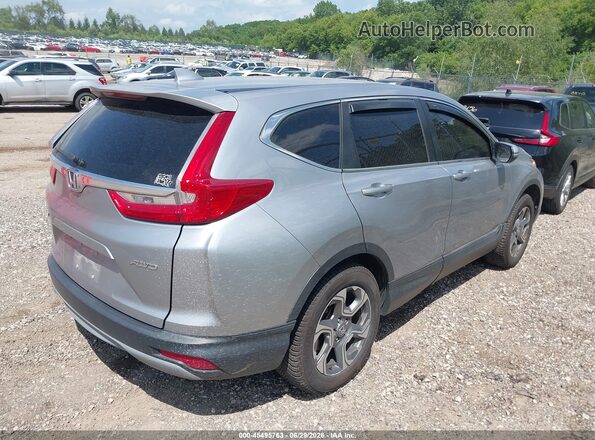 2HKRW2H56JH632989 2018 HONDA CR-V Серебряный Задняя правая четверть