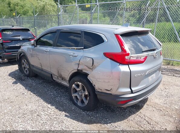 2HKRW2H56JH632989 2018 HONDA CR-V Серебряный Задняя левая четверть
