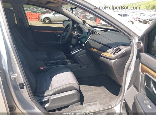 2HKRW2H56JH632989 2018 HONDA CR-V Серебряный Вид салона спереди