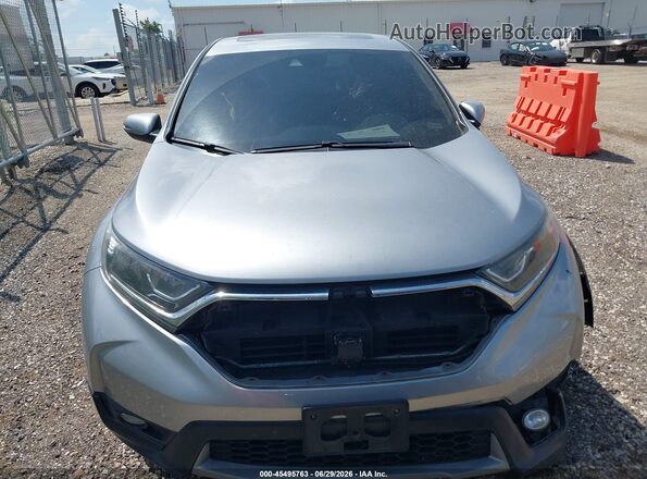 2HKRW2H56JH632989 2018 HONDA CR-V Серебряный Вид задней части салона