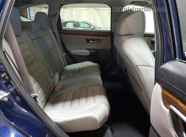 2HKRW2H56JH676748 2018 HONDA CR-V Blue Widok wnętrza z tyłu
