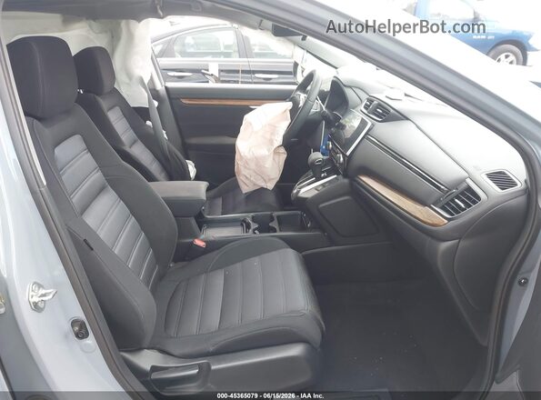 2HKRW2H57LH616982 2020 HONDA CR-V Синий Вид салона спереди