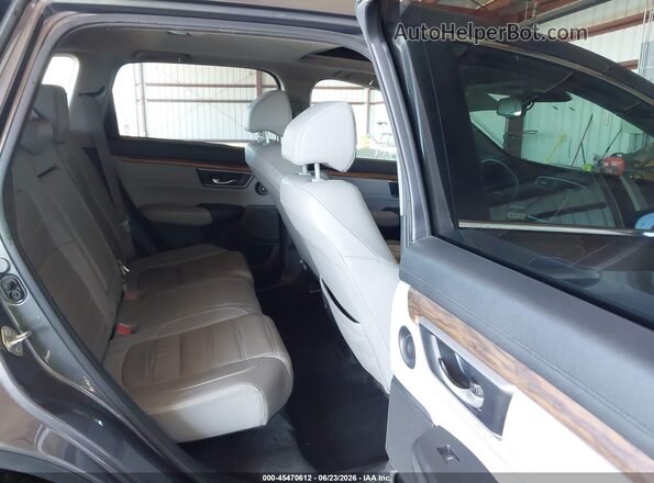2HKRW2H82HH654637 2017 HONDA CR-V Gray VIN კოდის სტიკერის ხედი