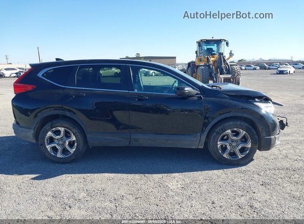 2HKRW2H85HH602211 2017 HONDA CR-V Черный Вид задней части салона