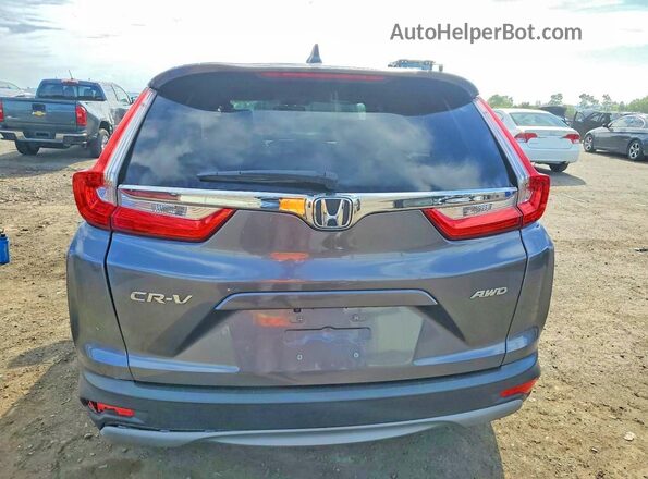 2HKRW2H85JH640995 2018 HONDA CR-V Gray Rear view