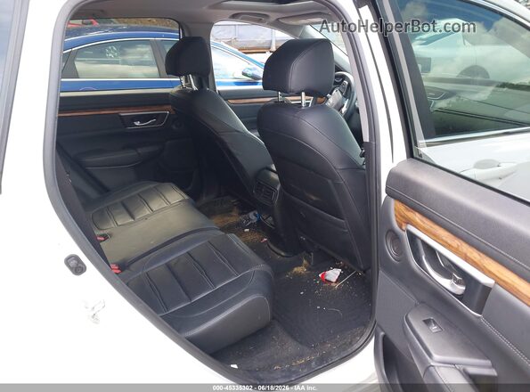 2HKRW2H85MH678151 2021 HONDA CR-V White VIN კოდის სტიკერის ხედი