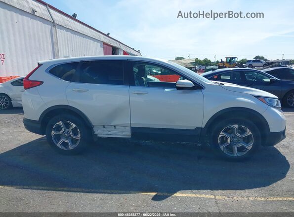 2HKRW2H86HH600175 2017 HONDA CR-V White Widok wnętrza z tyłu