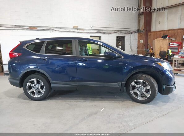 2HKRW2H86HH609958 2017 HONDA CR-V Blue უკანა სალონის ხედი