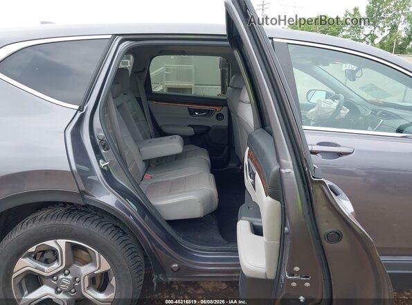 2HKRW2H87HH608964 2017 HONDA CR-V Gray VIN կոդի պիտակի տեսք