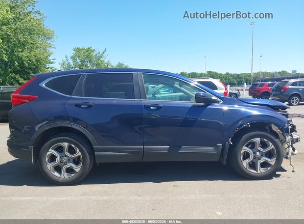 2HKRW2H89HH601420 2017 HONDA CR-V Navy Widok wnętrza z tyłu