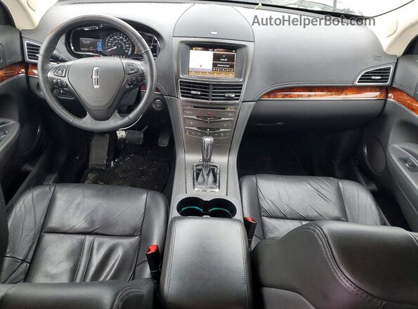 2LMHJ5AT5KBL03878 2019 LINCOLN MKT Серебряный Вид панели приборов