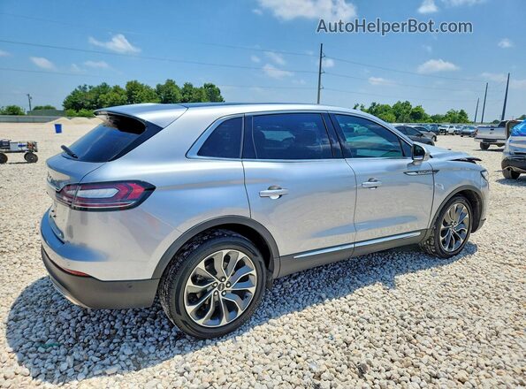 2LMPJ6K93NBL00132 2022 LINCOLN NAUTILUS Silver Rear right