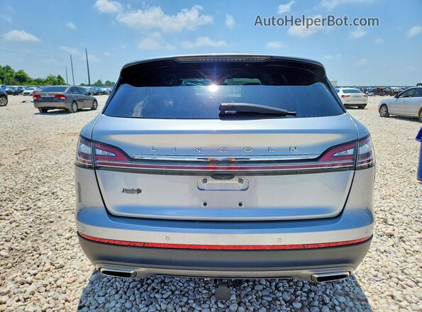 2LMPJ6K93NBL00132 2022 LINCOLN NAUTILUS Silver Rear view