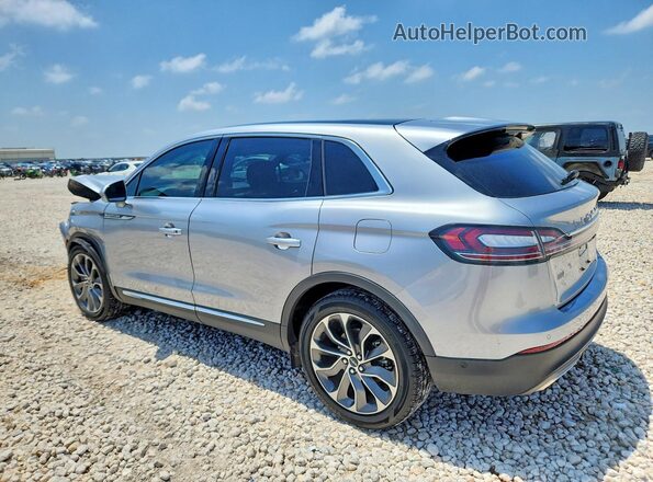 2LMPJ6K93NBL00132 2022 LINCOLN NAUTILUS Silver Rear left