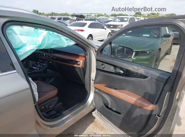 2LMPJ6K9XPBL08165 2023 LINCOLN NAUTILUS Gray Vista interior delantera