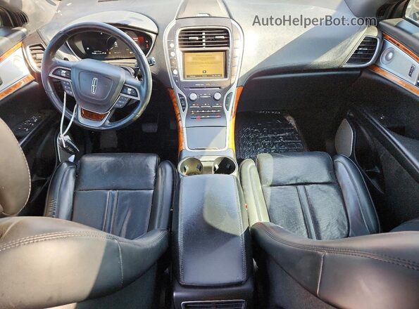 2LMPJ6L91KBL23239 2019 LINCOLN NAUTILUS Red Widok deski rozdzielczej