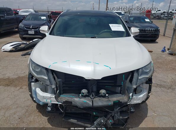 2LMPJ6LR1GBL38850 2016 LINCOLN MKX White Вид задньої частини салону