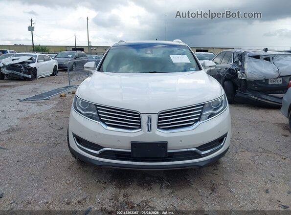 2LMPJ6LR1JBL48205 2018 LINCOLN MKX White ხელსაწყოთა პანელის ხედი