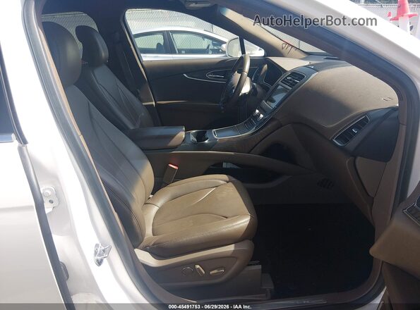 2LMPJ6LR2HBL40673 2017 LINCOLN MKX Желтый Вид салона спереди