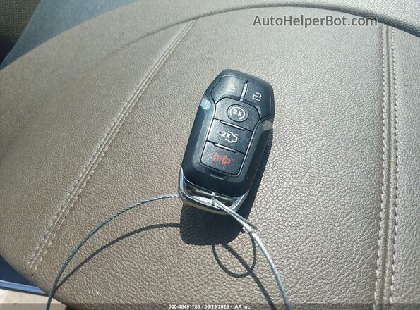 2LMPJ6LR2HBL40673 2017 LINCOLN MKX Желтый Вид панели приборов