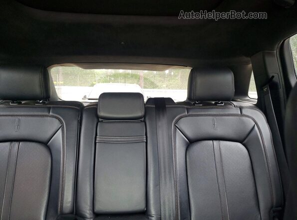 2LMPJ7JP0GBL44159 2016 LINCOLN MKX White Vista de los asientos traseros